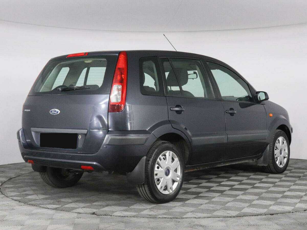 Купить Ford Fusion с пробегом. Фото: #2