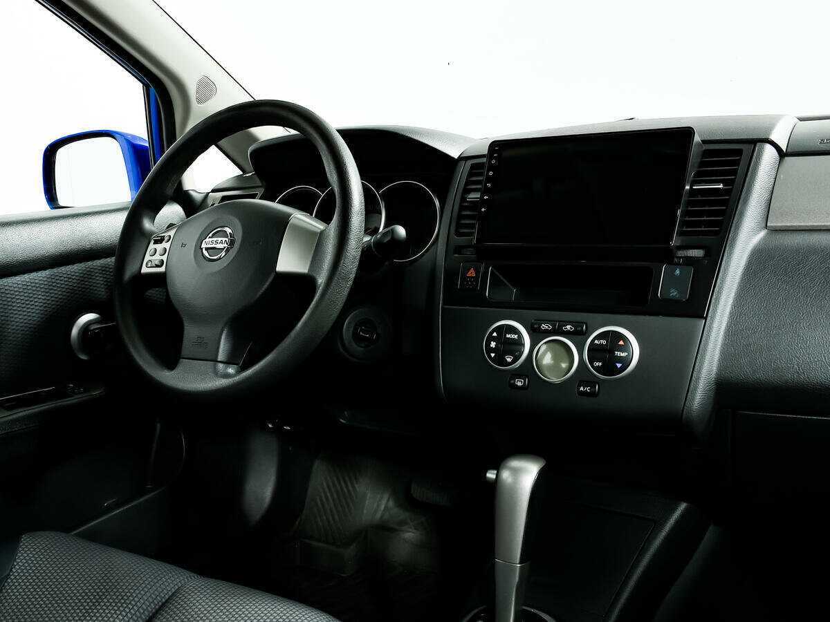 Купить Nissan Tiida с пробегом. Фото: #8
