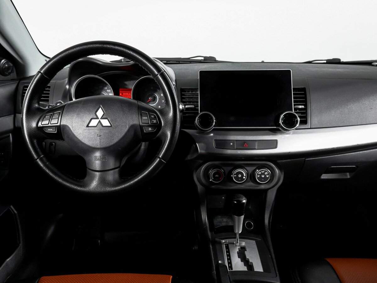 Купить Mitsubishi Lancer с пробегом. Фото: #11