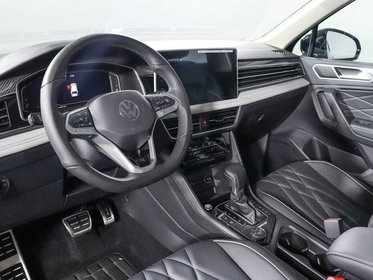 Купить Volkswagen Tiguan с пробегом. Фото: #12