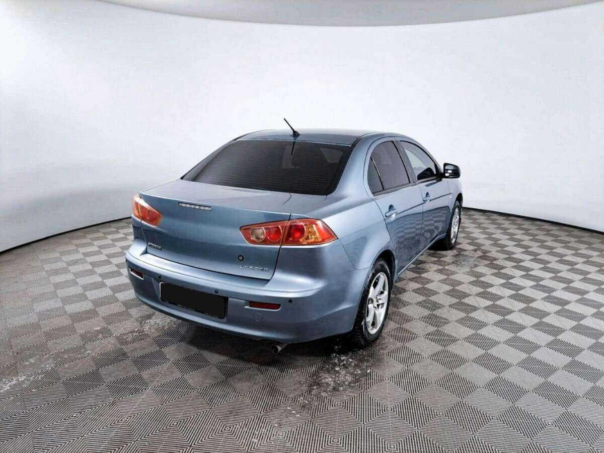 Купить Mitsubishi Lancer с пробегом. Фото: #4