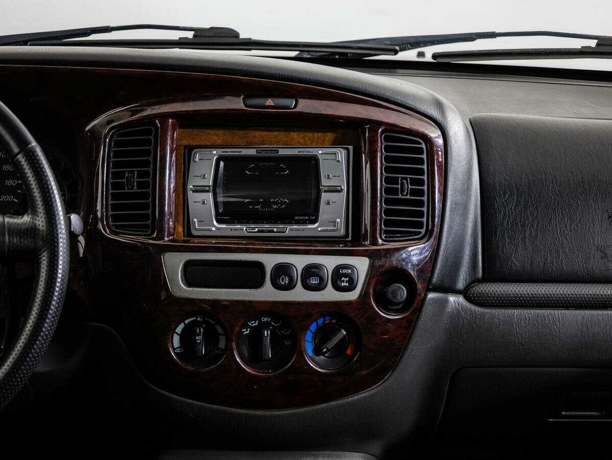 Купить Mazda Tribute с пробегом. Фото: #11