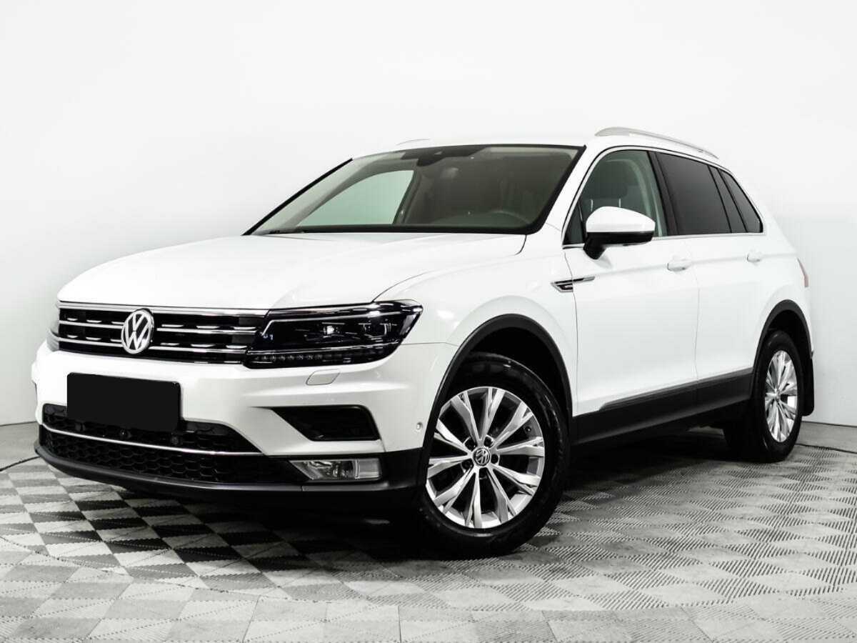 Купить Volkswagen Tiguan с пробегом. Посмотреть фото
