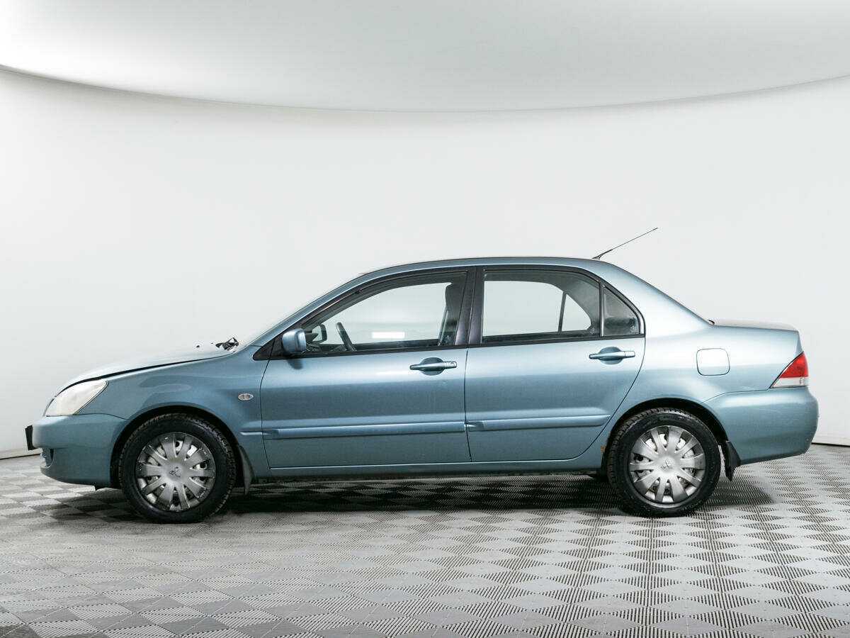 Купить Mitsubishi Lancer с пробегом. Фото: #7