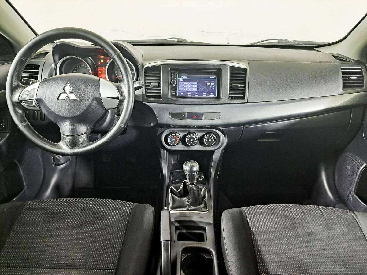 Купить Mitsubishi Lancer с пробегом. Фото: #11
