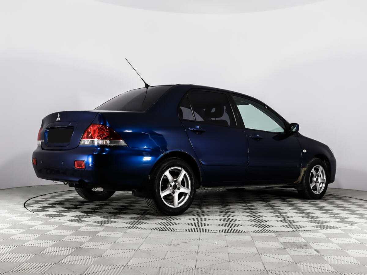 Купить Mitsubishi Lancer с пробегом. Фото: #4