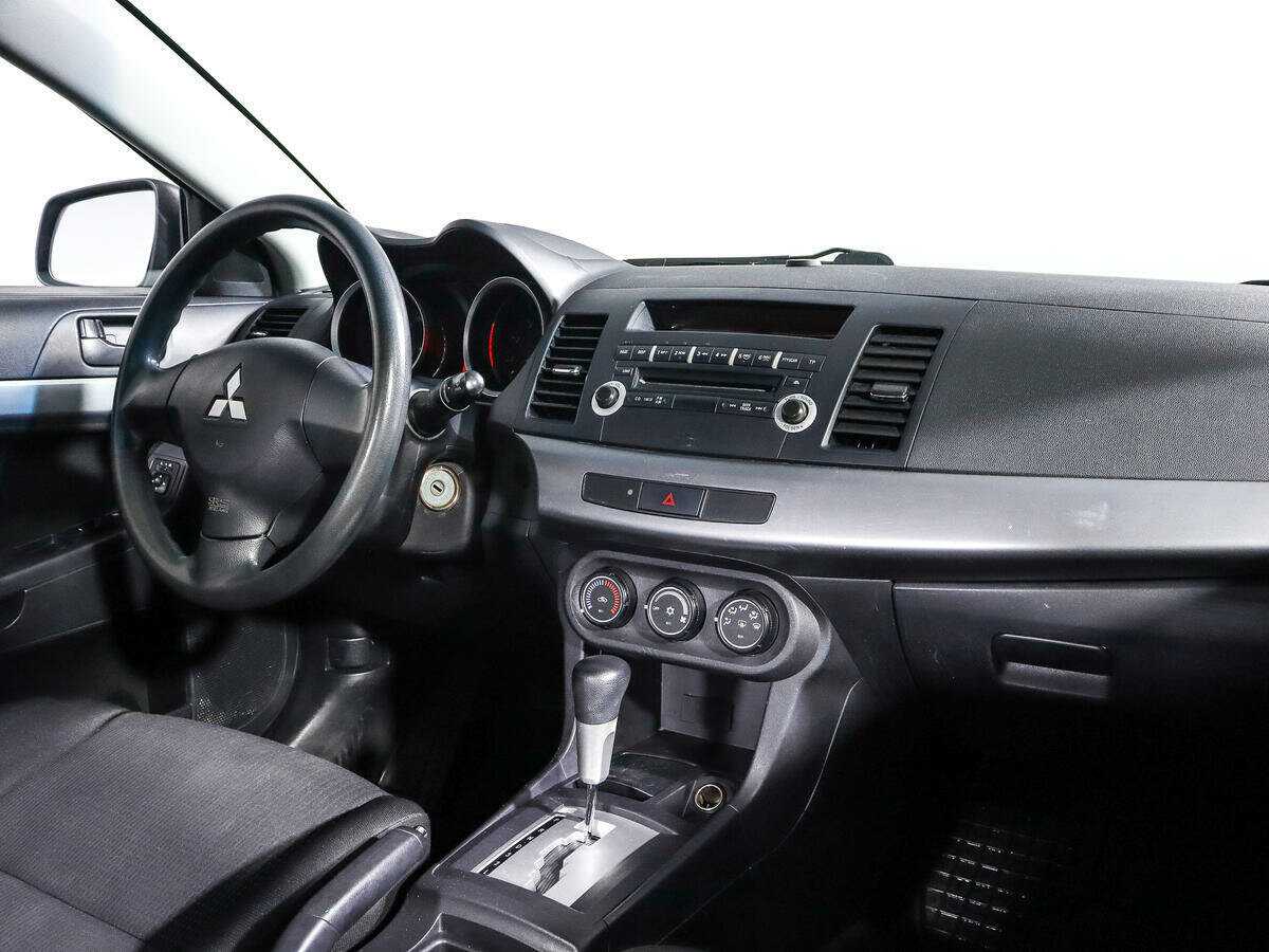 Купить Mitsubishi Lancer с пробегом. Фото: #8