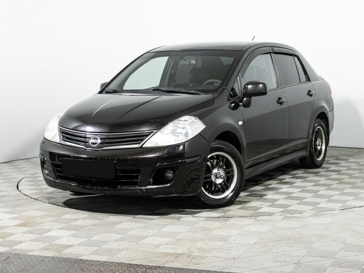 Купить Nissan Tiida с пробегом. Посмотреть фото