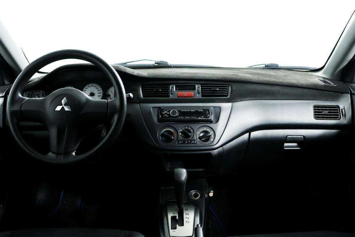 Купить Mitsubishi Lancer с пробегом. Фото: #10