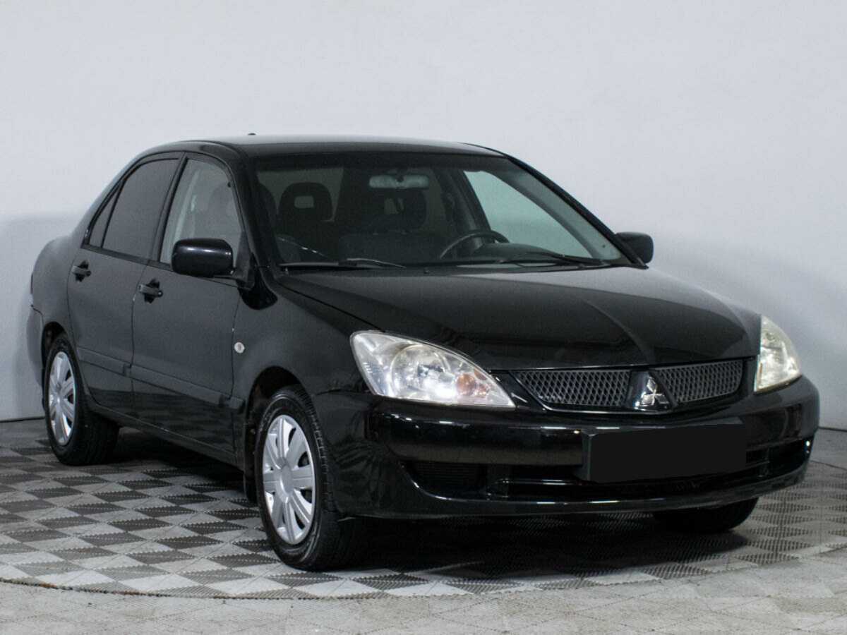 Купить Mitsubishi Lancer с пробегом. Фото: #2