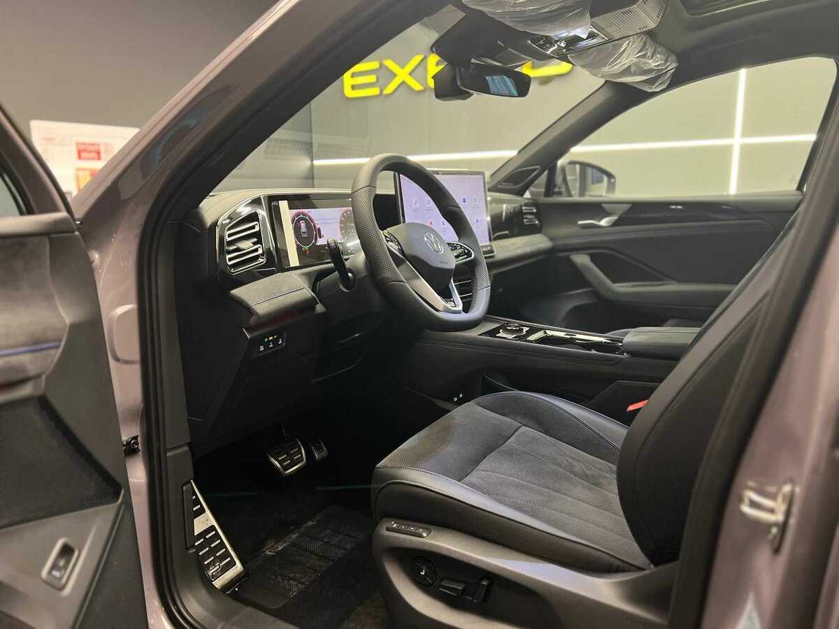 Купить Volkswagen Tiguan с пробегом. Фото: #9