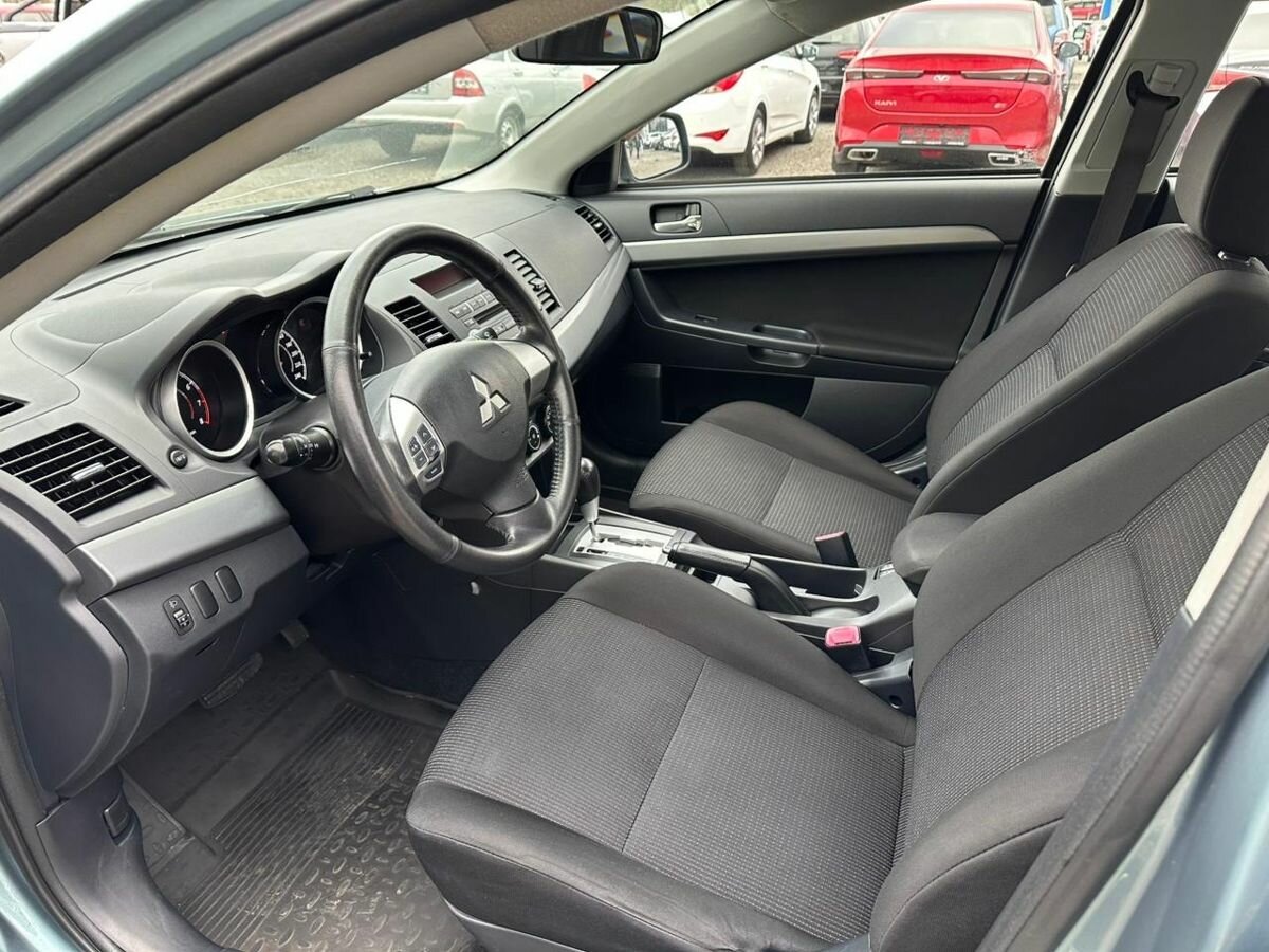 Купить Mitsubishi Lancer с пробегом. Фото: #4