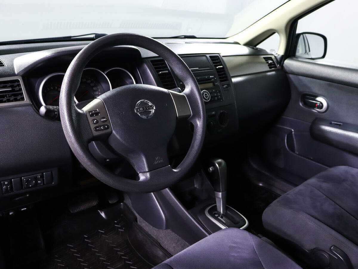 Купить Nissan Tiida с пробегом. Фото: #11