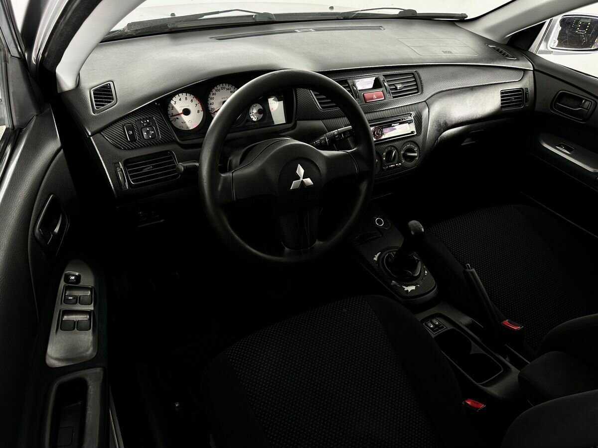 Купить Mitsubishi Lancer с пробегом. Фото: #4