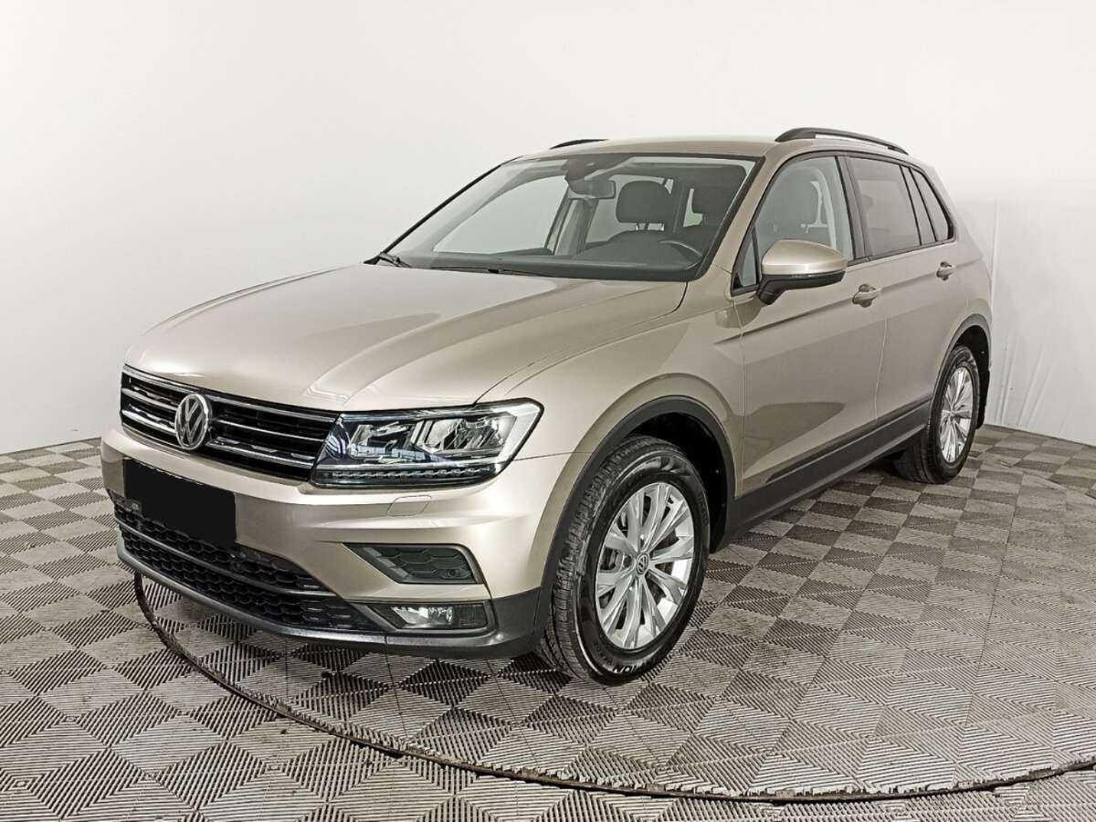 Купить Volkswagen Tiguan с пробегом. Посмотреть фото