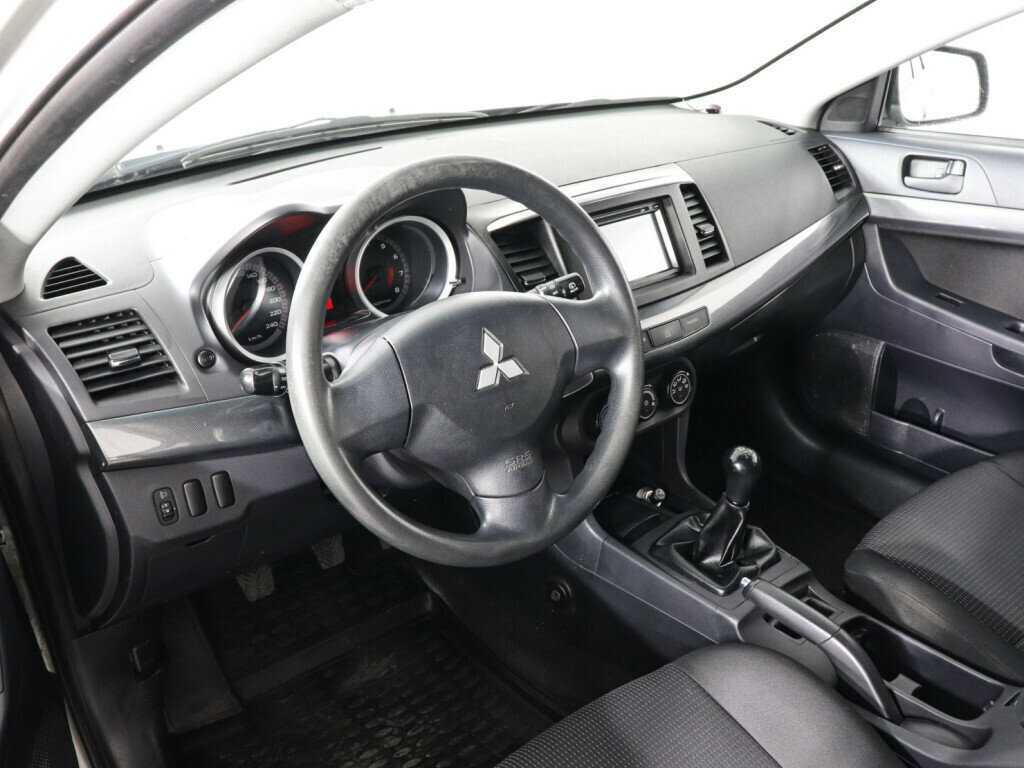 Купить Mitsubishi Lancer с пробегом. Фото: #4