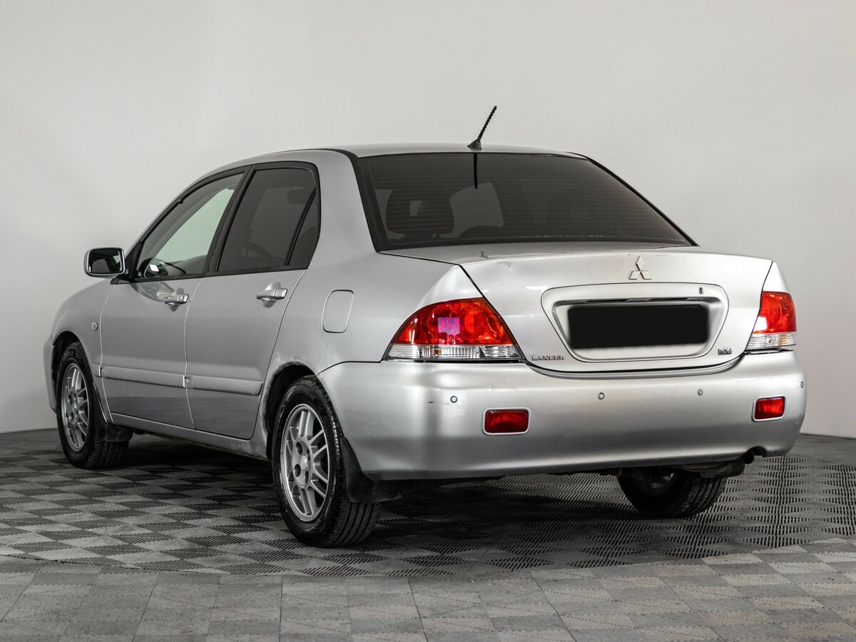 Купить Mitsubishi Lancer с пробегом. Фото: #5