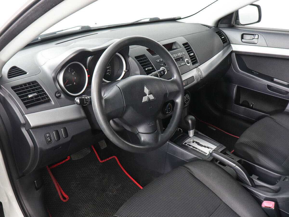 Купить Mitsubishi Lancer с пробегом. Фото: #8