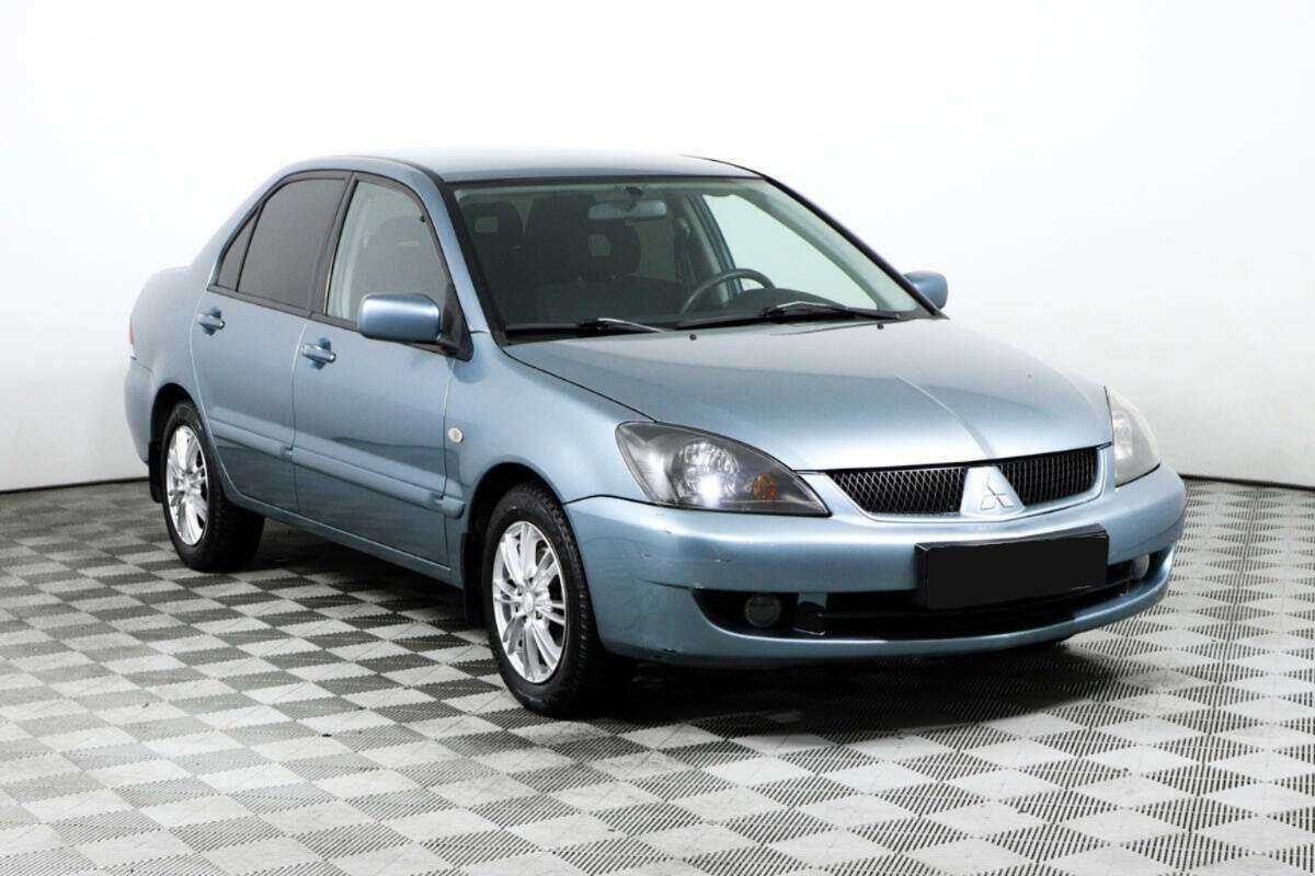 Купить Mitsubishi Lancer с пробегом. Фото: #2