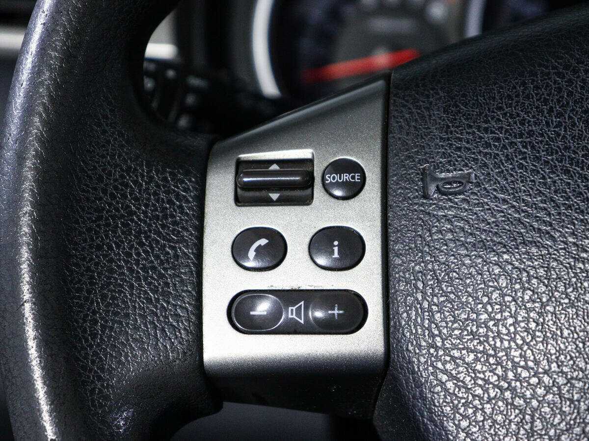 Купить Nissan Tiida с пробегом. Фото: #16