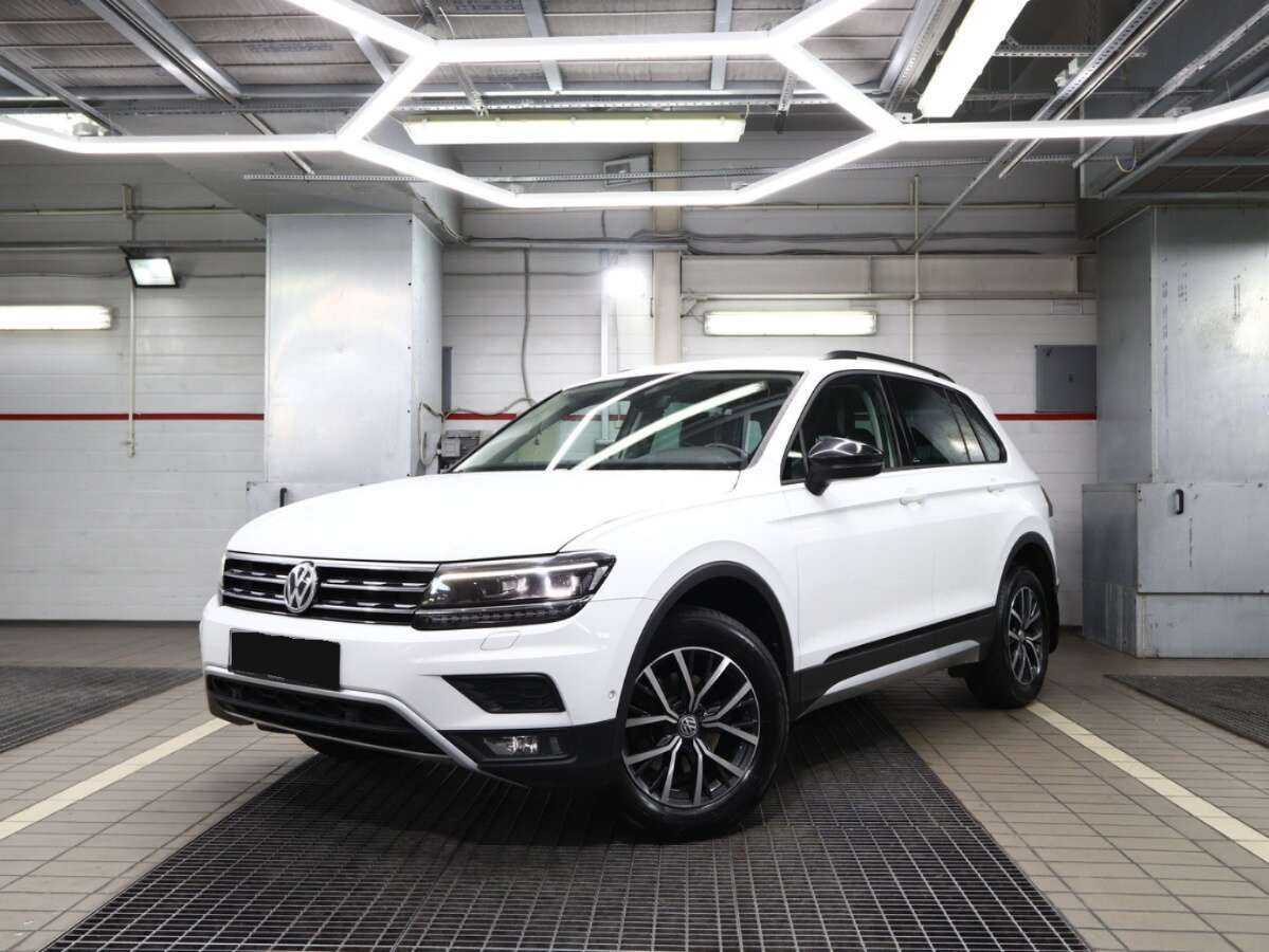 Купить Volkswagen Tiguan с пробегом. Посмотреть фото