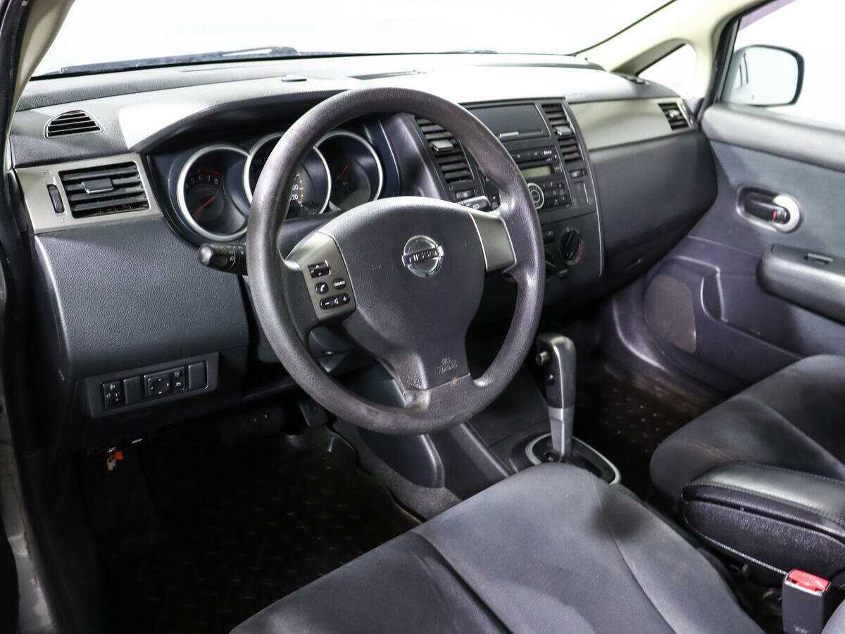 Купить Nissan Tiida с пробегом. Фото: #11
