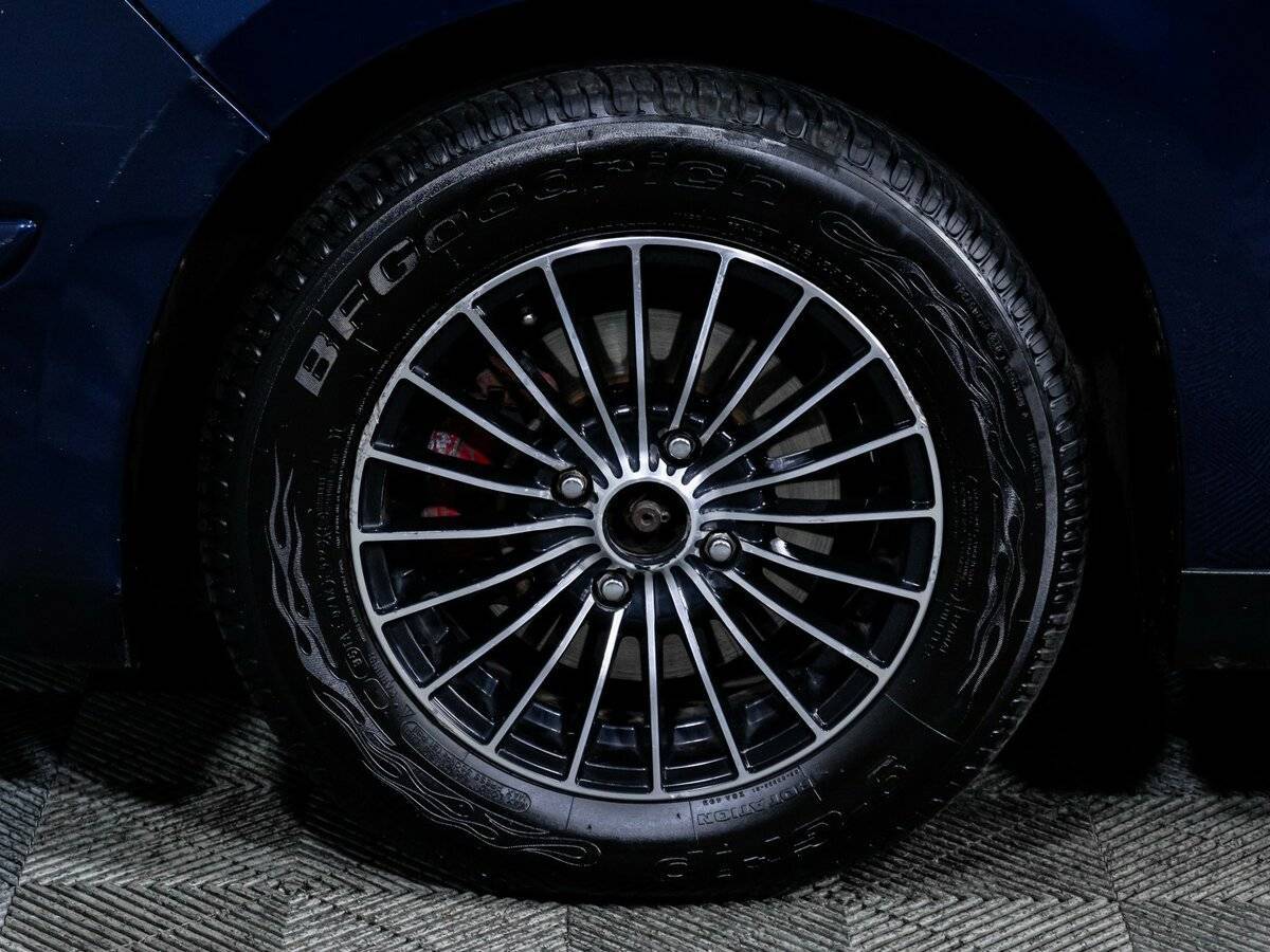 Купить Nissan Tiida с пробегом. Фото: #14