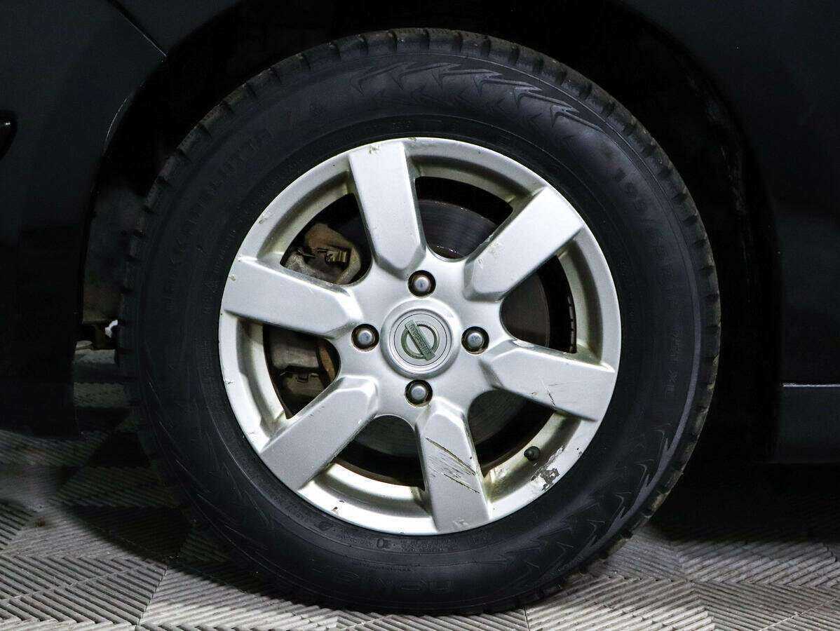 Купить Nissan Tiida с пробегом. Фото: #11