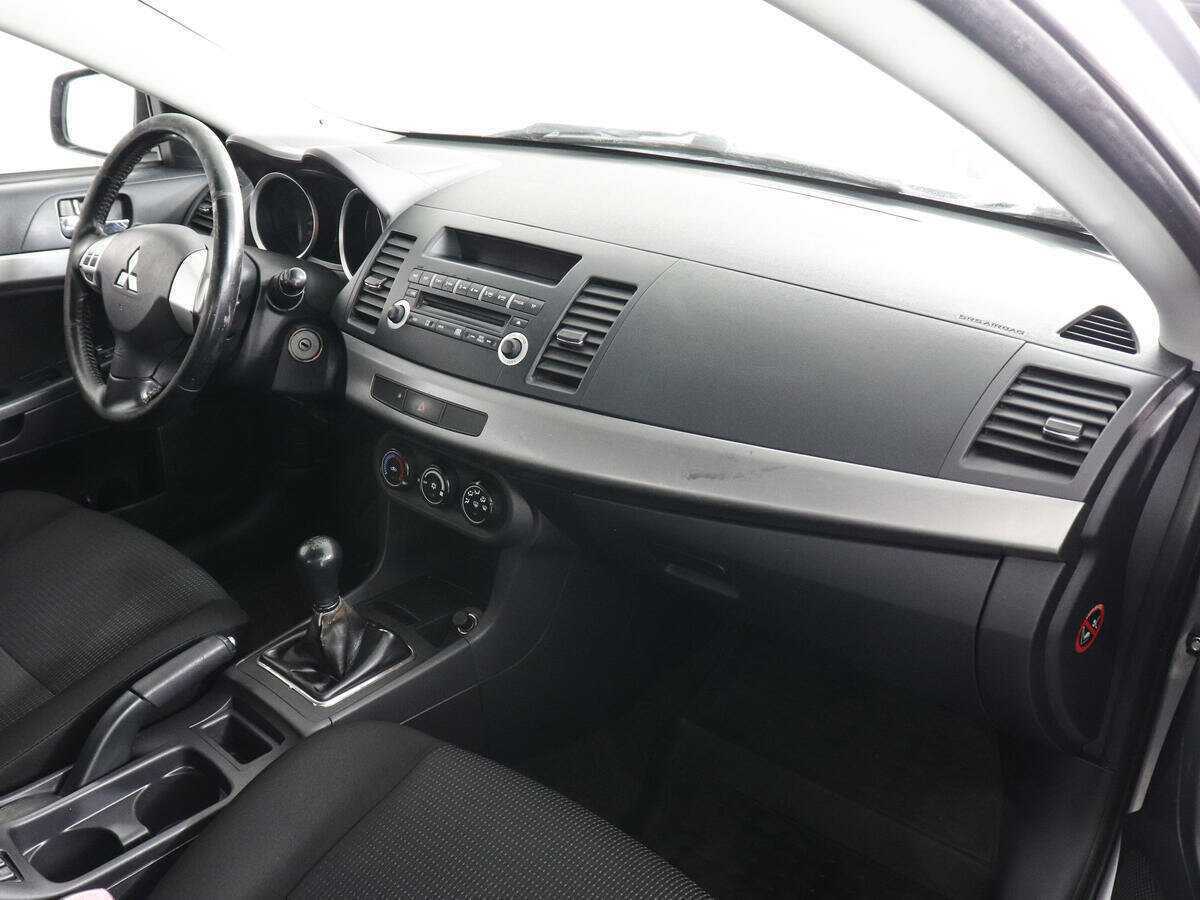 Купить Mitsubishi Lancer с пробегом. Фото: #5
