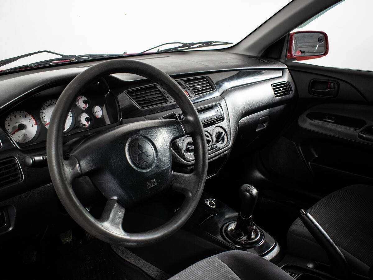 Купить Mitsubishi Lancer с пробегом. Фото: #12