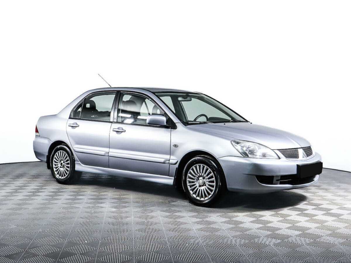 Купить Mitsubishi Lancer с пробегом. Фото: #2