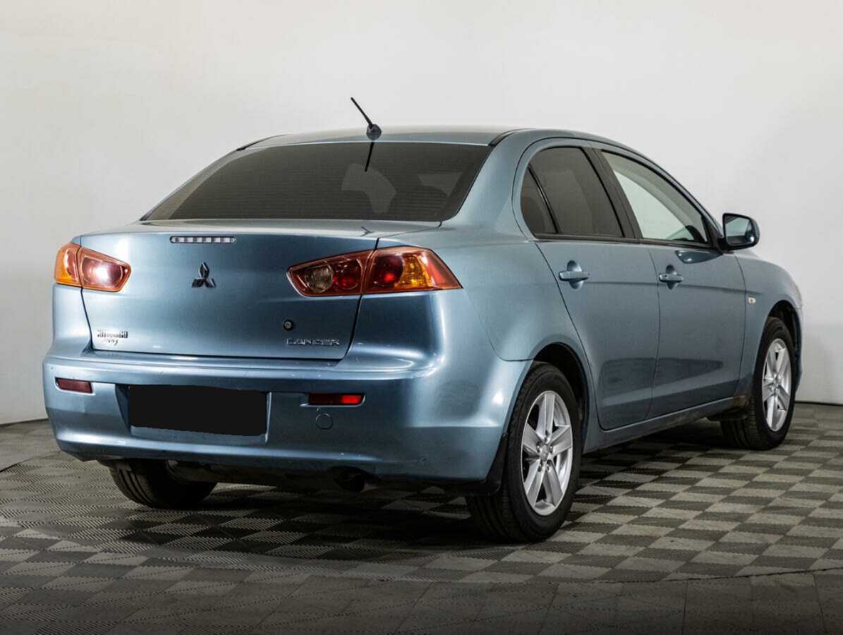 Купить Mitsubishi Lancer с пробегом. Фото: #4