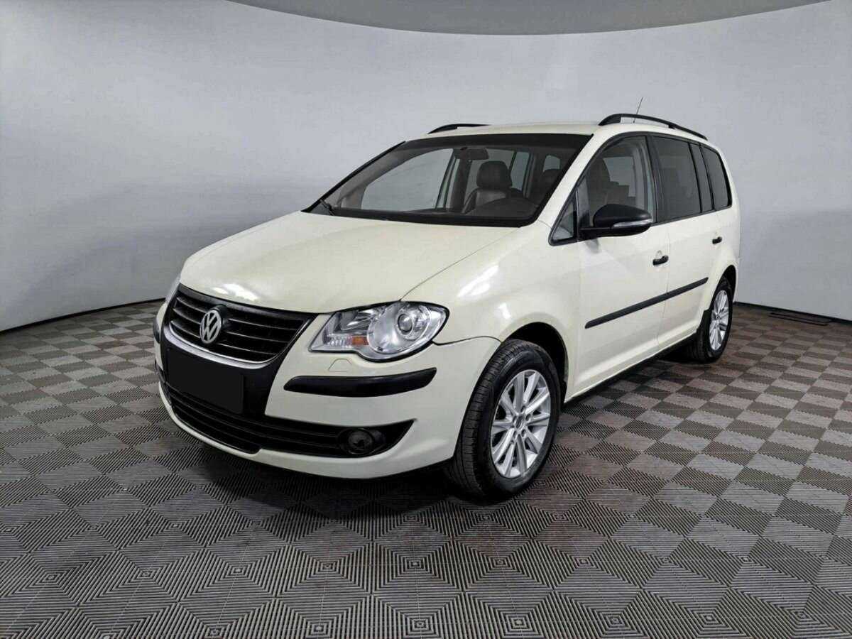 Купить Volkswagen Touran с пробегом. Посмотреть фото
