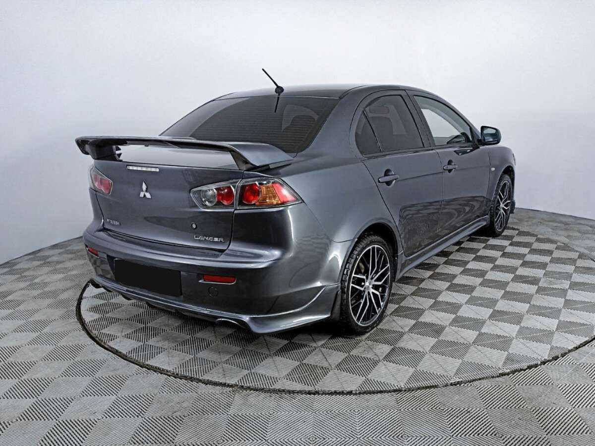 Купить Mitsubishi Lancer с пробегом. Фото: #4