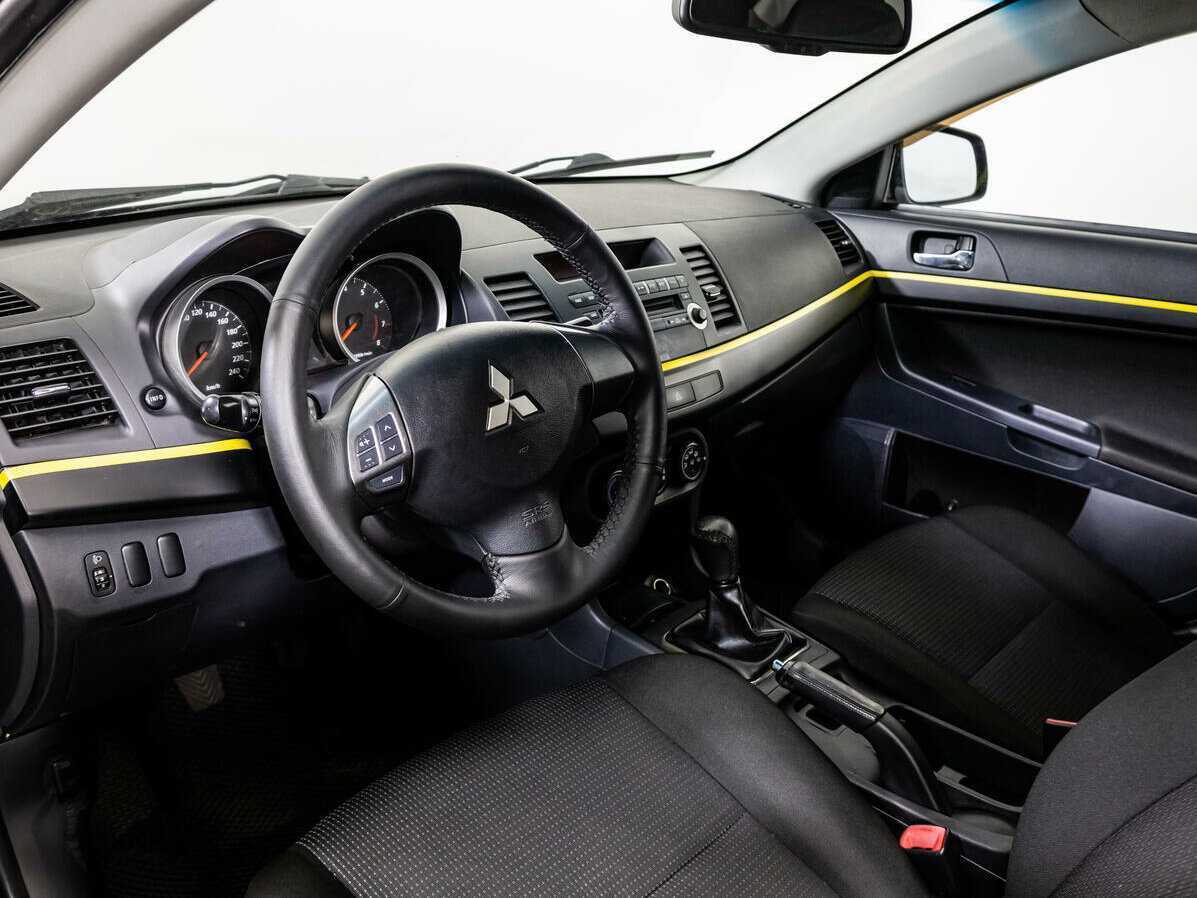 Купить Mitsubishi Lancer с пробегом. Фото: #8