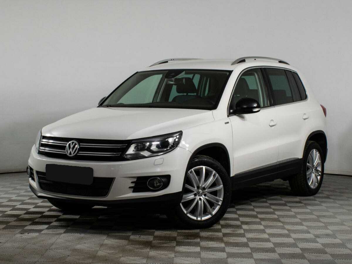 Купить Volkswagen Tiguan с пробегом. Посмотреть фото