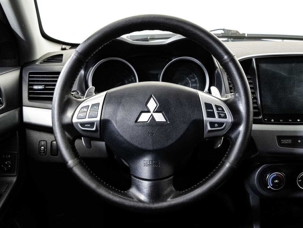 Купить Mitsubishi Lancer с пробегом. Фото: #11