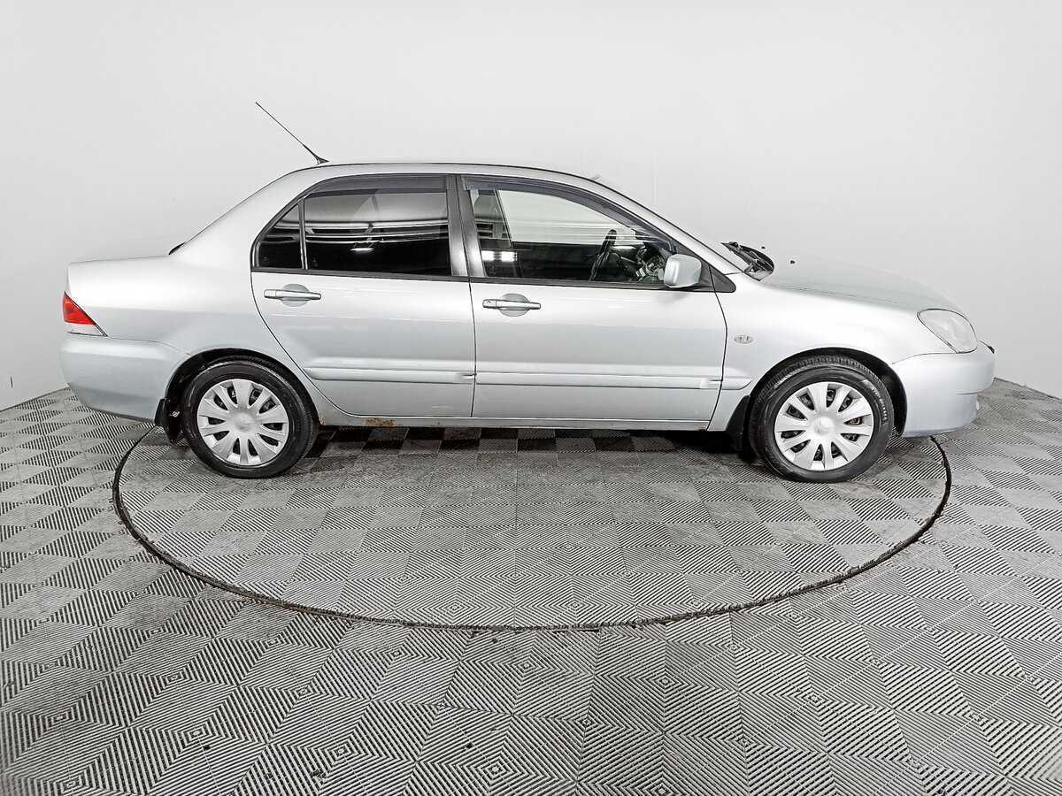 Купить Mitsubishi Lancer с пробегом. Фото: #3