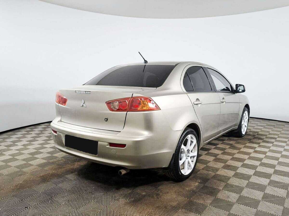 Купить Mitsubishi Lancer с пробегом. Фото: #4