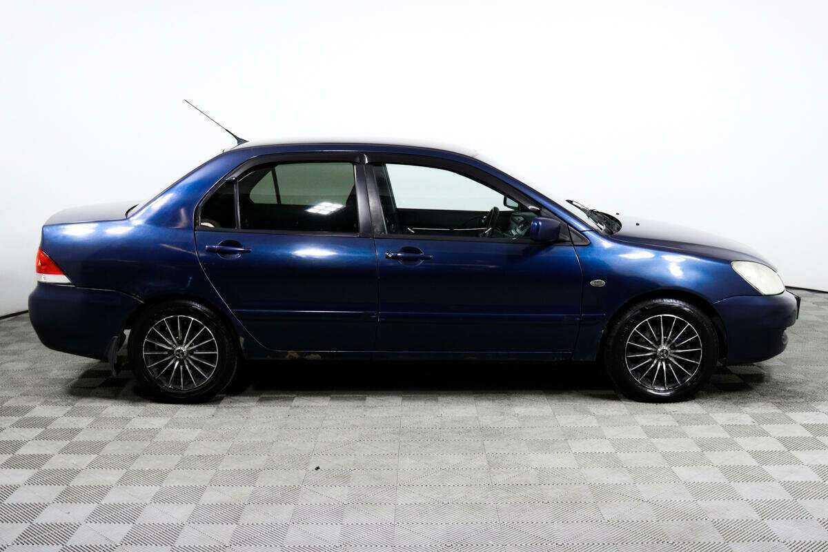 Купить Mitsubishi Lancer с пробегом. Фото: #3