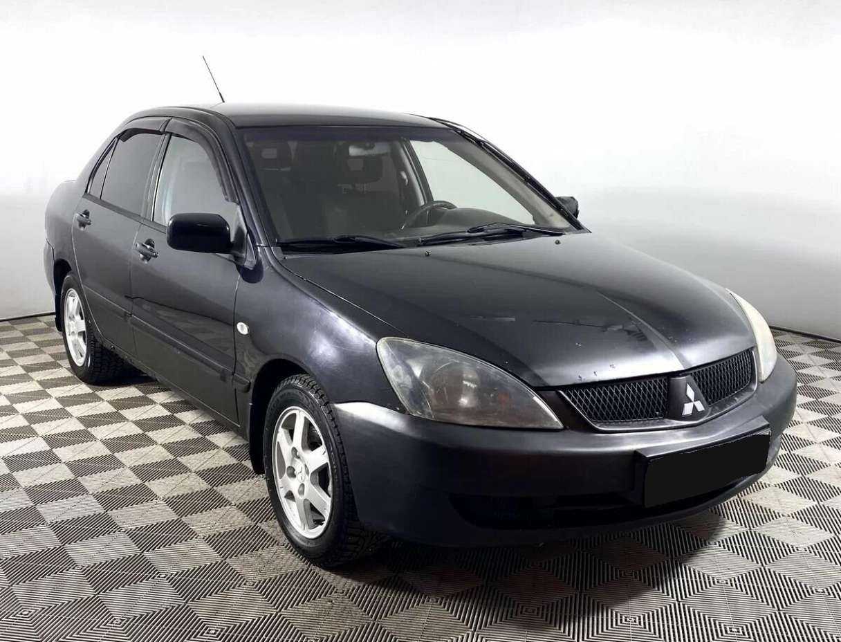 Купить Mitsubishi Lancer с пробегом. Фото: #2