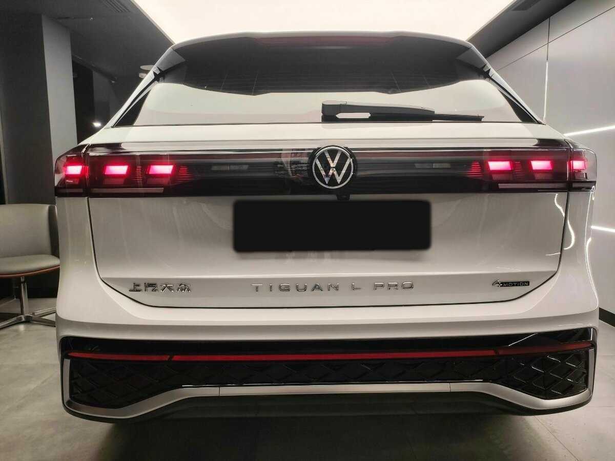 Купить Volkswagen Tiguan с пробегом. Фото: #4