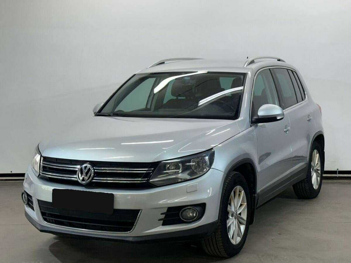 Купить Volkswagen Tiguan с пробегом. Посмотреть фото