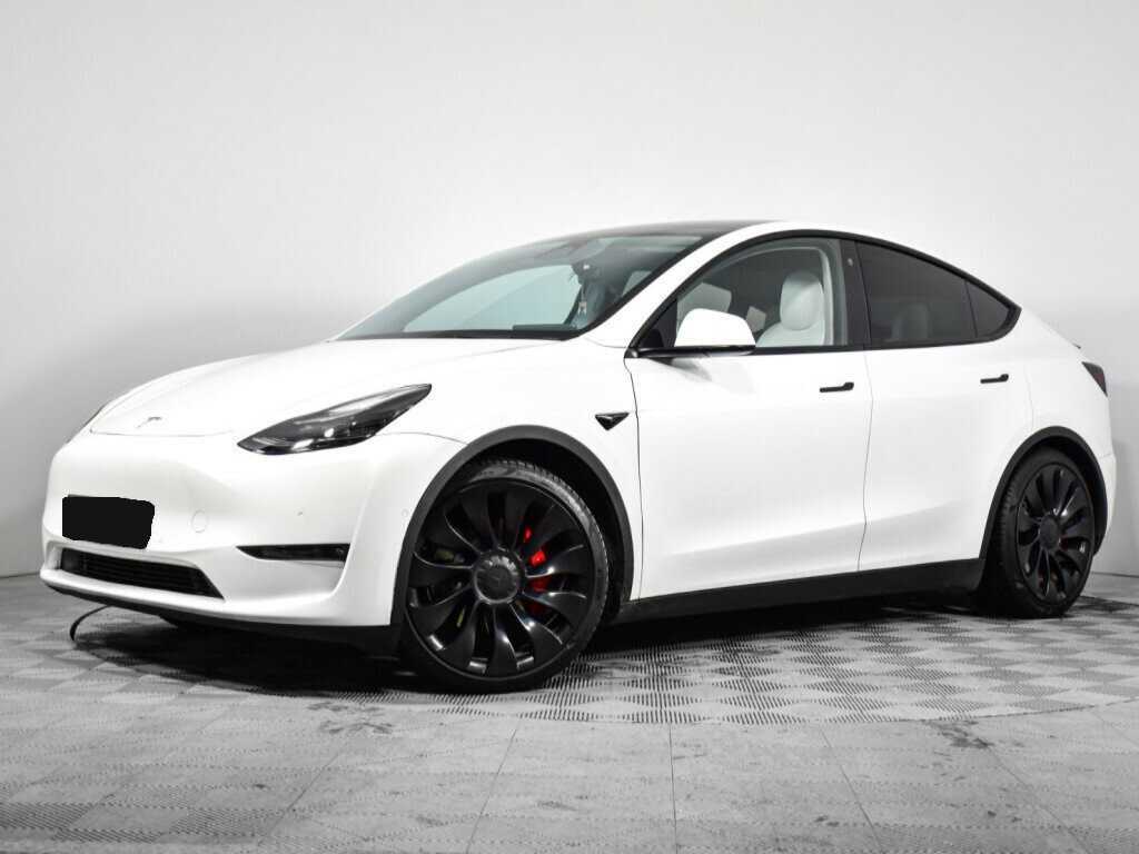 Купить Tesla Model Y с пробегом. Посмотреть фото