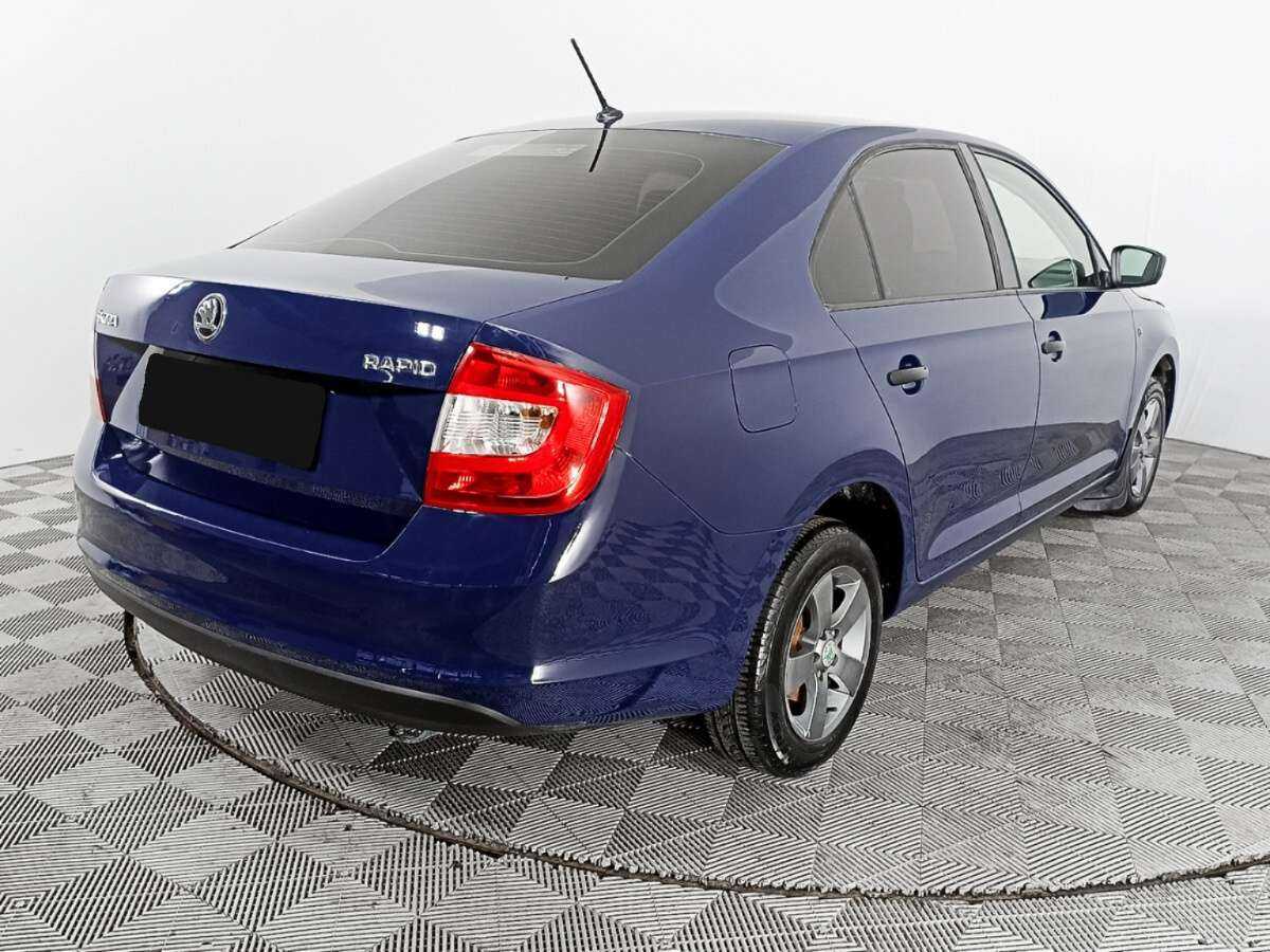 Купить Skoda Rapid с пробегом. Фото: #4