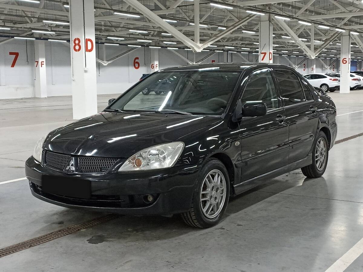 Купить Mitsubishi Lancer с пробегом. Посмотреть фото