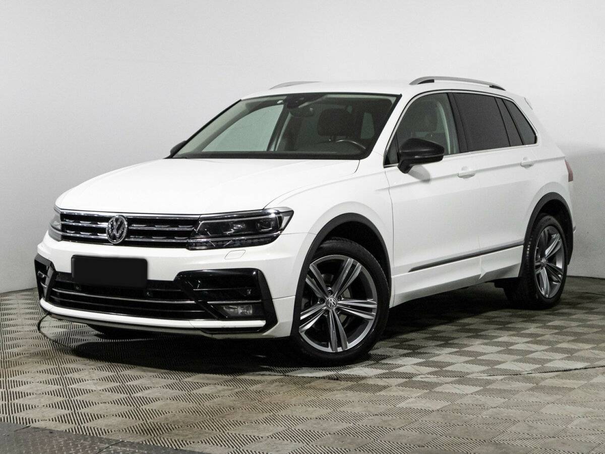 Купить Volkswagen Tiguan с пробегом. Посмотреть фото