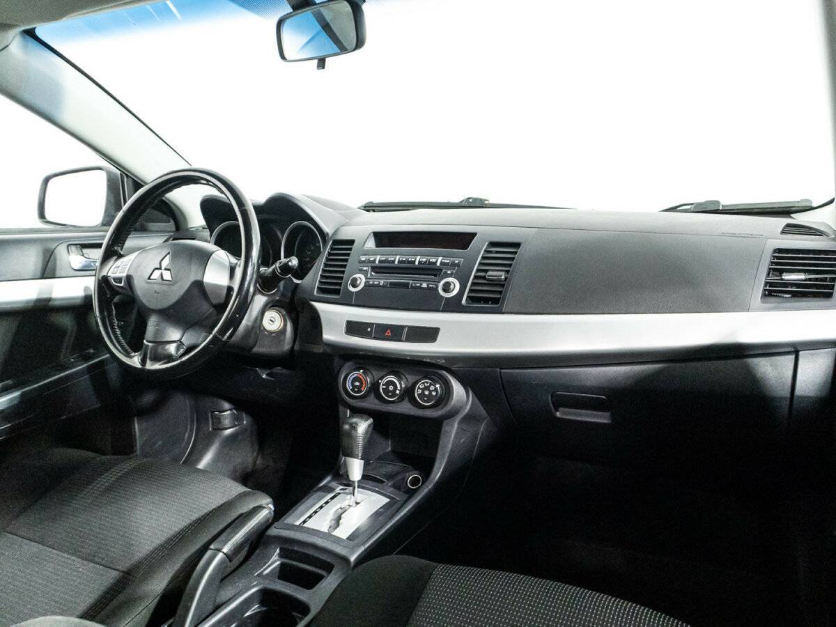Купить Mitsubishi Lancer с пробегом. Фото: #8