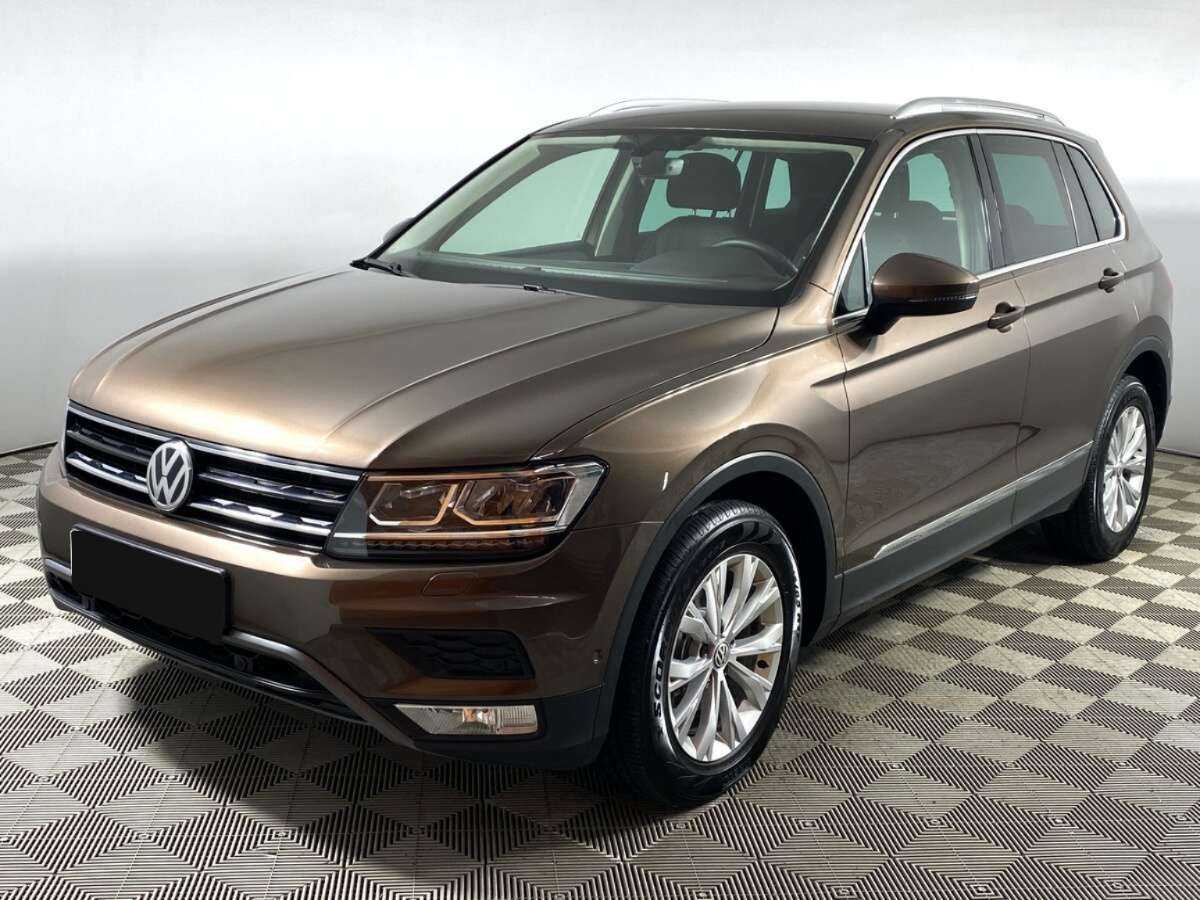Купить Volkswagen Tiguan с пробегом. Посмотреть фото