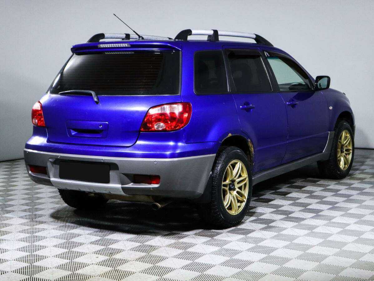 Купить Mitsubishi Outlander с пробегом. Фото: #4